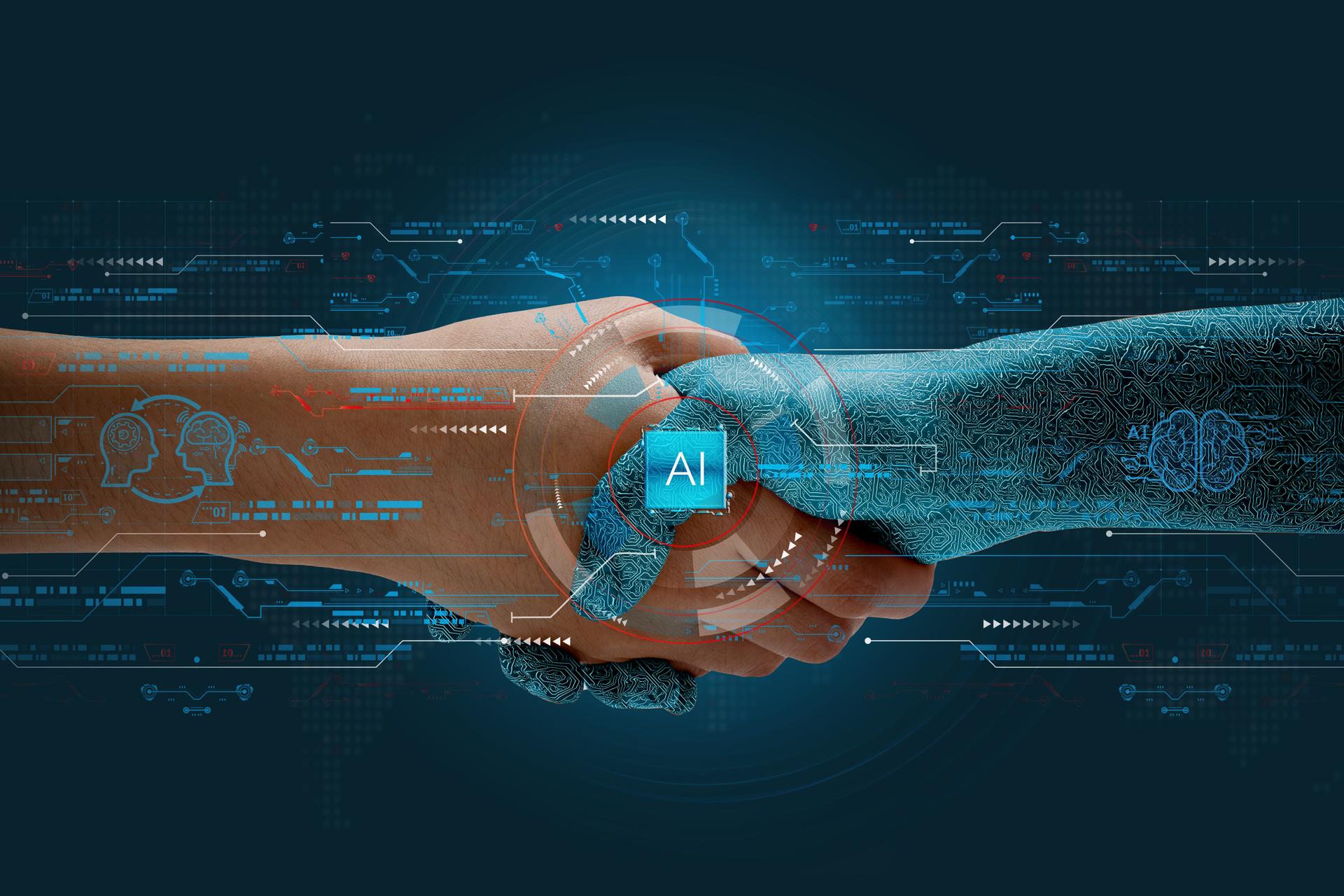 Humans shake hands with AI to show partnership. Machine learning to enable and work together to achieve greater innovation and success.